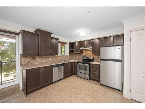 303-1212 Fennell Avenue E, Hamilton, ON - Indoor Photo Showing Kitchen With Stainless Steel Kitchen With Double Sink