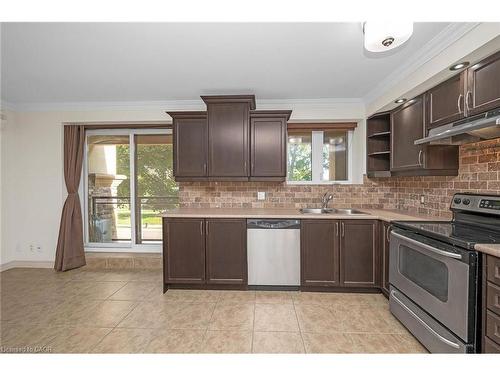 303-1212 Fennell Avenue E, Hamilton, ON - Indoor Photo Showing Kitchen With Stainless Steel Kitchen With Double Sink With Upgraded Kitchen