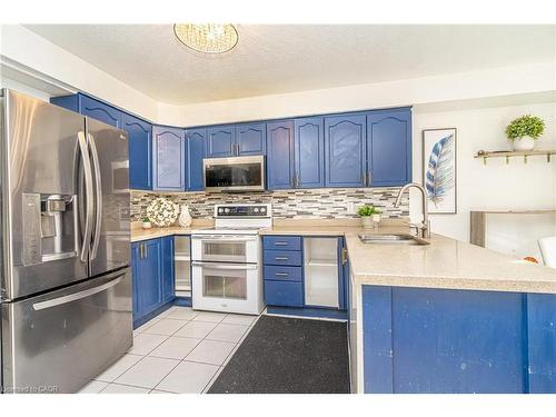 317 Bankside Drive, Kitchener, ON - Indoor Photo Showing Kitchen With Double Sink With Upgraded Kitchen