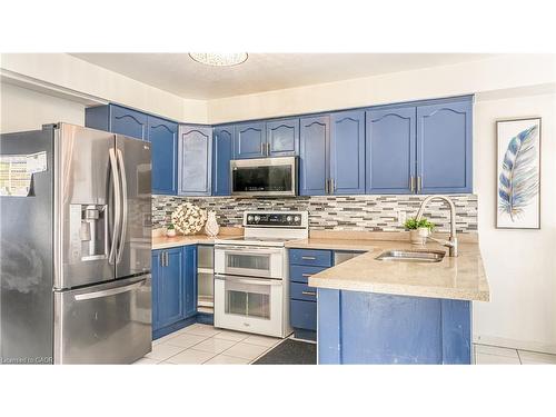 317 Bankside Drive, Kitchener, ON - Indoor Photo Showing Kitchen With Double Sink With Upgraded Kitchen