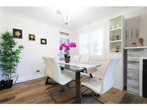 2105 Maplewood Drive, Burlington, ON - Indoor Photo Showing Dining Room With Fireplace