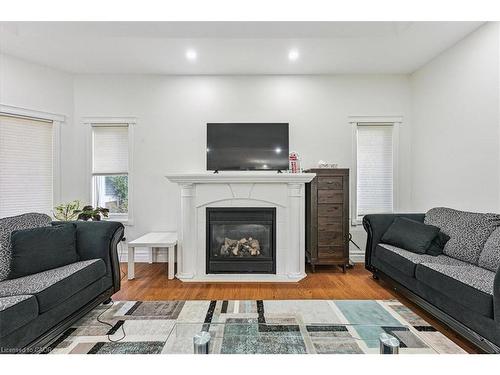 107 Deschene Avenue, Hamilton, ON - Indoor Photo Showing Living Room With Fireplace