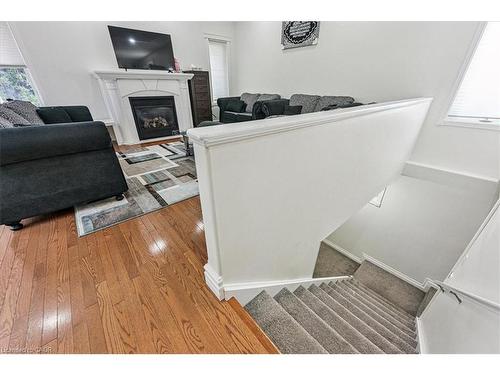 107 Deschene Avenue, Hamilton, ON - Indoor Photo Showing Other Room With Fireplace