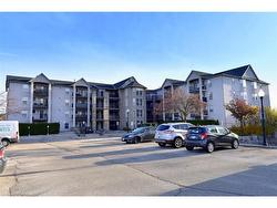 203-1421 Walkers Line  Burlington, ON L7M 4P4