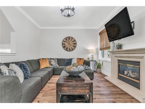 273 Duskywing Way, Oakville, ON - Indoor Photo Showing Living Room With Fireplace