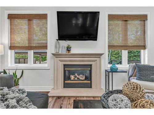 273 Duskywing Way, Oakville, ON - Indoor Photo Showing Living Room With Fireplace