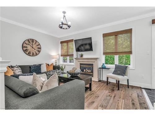 273 Duskywing Way, Oakville, ON - Indoor Photo Showing Living Room With Fireplace