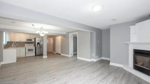 Lower-107 Horning Drive, Hamilton, ON - Indoor With Fireplace