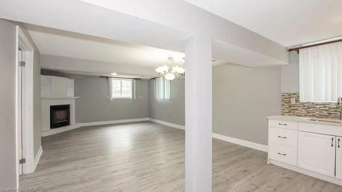 Lower-107 Horning Drive, Hamilton, ON - Indoor With Fireplace