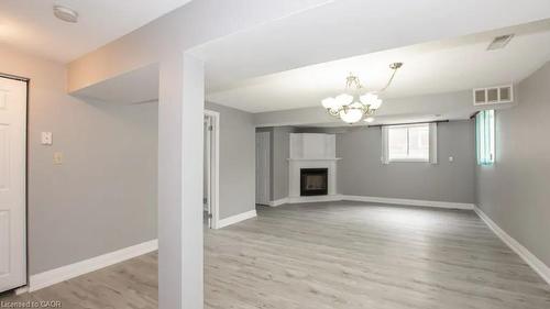 Lower-107 Horning Drive, Hamilton, ON - Indoor With Fireplace
