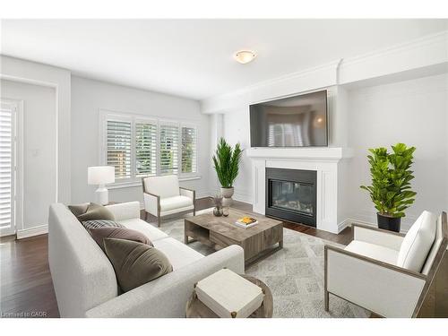 7 Windsor Circle, Niagara-On-The-Lake, ON - Indoor Photo Showing Living Room With Fireplace