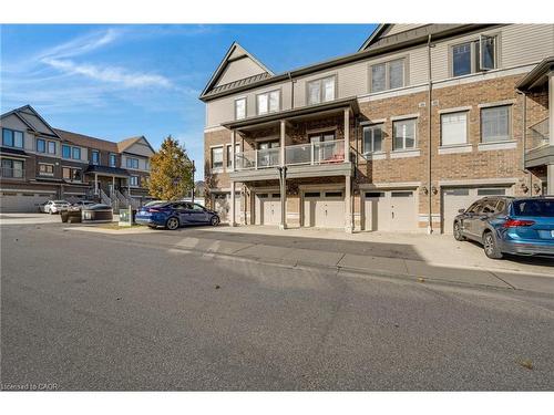 E7-70 Willowrun Drive, Kitchener, ON - Outdoor With Balcony With Facade