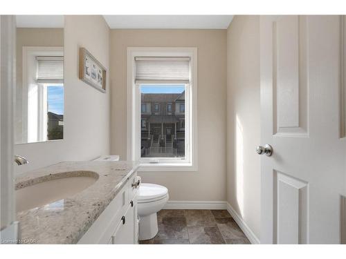 E7-70 Willowrun Drive, Kitchener, ON - Indoor Photo Showing Bathroom