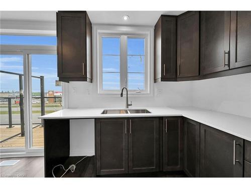 35-120 Court Drive, Paris, ON - Indoor Photo Showing Kitchen With Double Sink