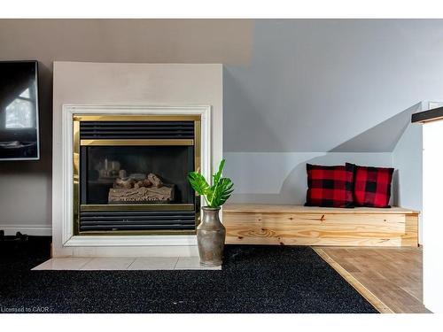 34 Holton Avenue S, Hamilton, ON - Indoor Photo Showing Living Room With Fireplace
