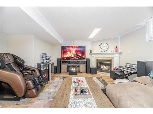 908 Gabor Street, London, ON - Indoor Photo Showing Living Room With Fireplace