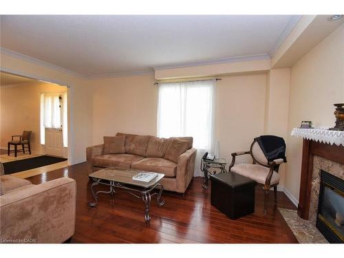 49-7 Southside Place, Hamilton, ON - Indoor Photo Showing Living Room With Fireplace