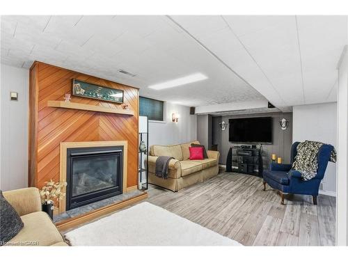 91 East 42Nd Street, Hamilton, ON - Indoor Photo Showing Living Room With Fireplace