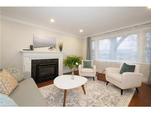 296 Dumfries Avenue, Kitchener, ON - Indoor Photo Showing Living Room With Fireplace