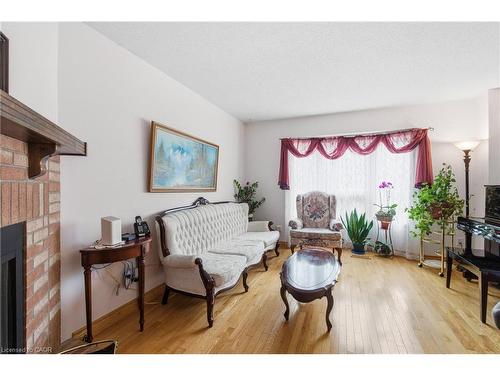 3372 Bobwhite Mews, Mississauga, ON - Indoor Photo Showing Living Room With Fireplace