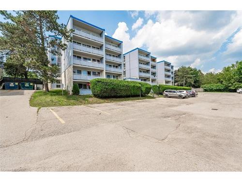102-105 Conroy Crescent, Guelph, ON - Outdoor With Balcony With Facade