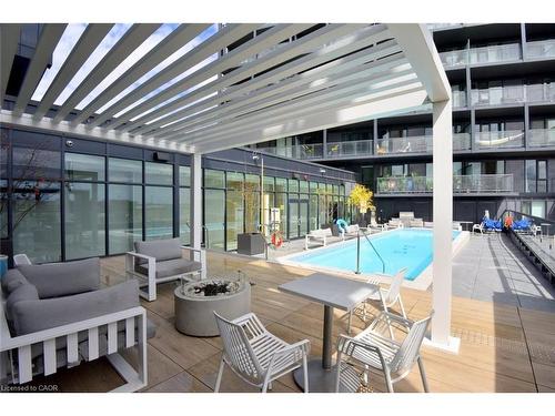 B1006-3200 Dakota Common, Burlington, ON - Outdoor With In Ground Pool