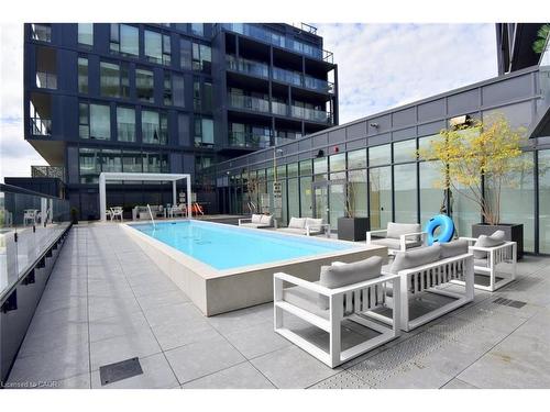 B1006-3200 Dakota Common, Burlington, ON - Outdoor With In Ground Pool