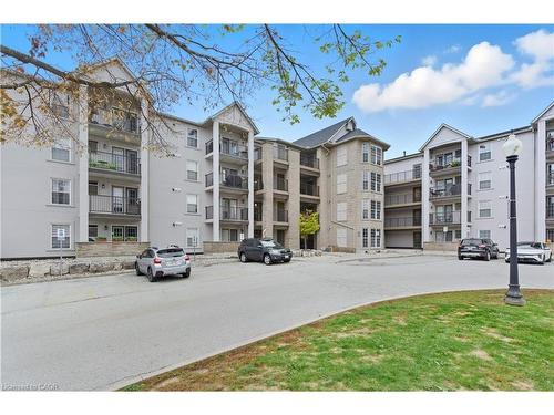 409-1411 Walker'S Line, Burlington, ON - Outdoor With Balcony With Facade