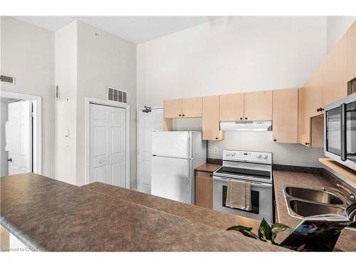 409-1411 Walker'S Line, Burlington, ON - Indoor Photo Showing Kitchen With Double Sink