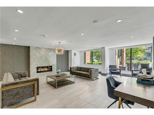 404-1270 Maple Crossing Boulevard, Burlington, ON - Indoor With Fireplace