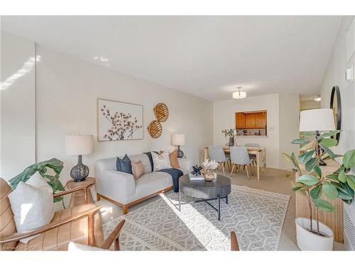 404-1270 Maple Crossing Boulevard, Burlington, ON - Indoor Photo Showing Living Room