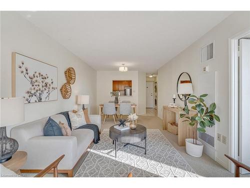 404-1270 Maple Crossing Boulevard, Burlington, ON - Indoor Photo Showing Living Room