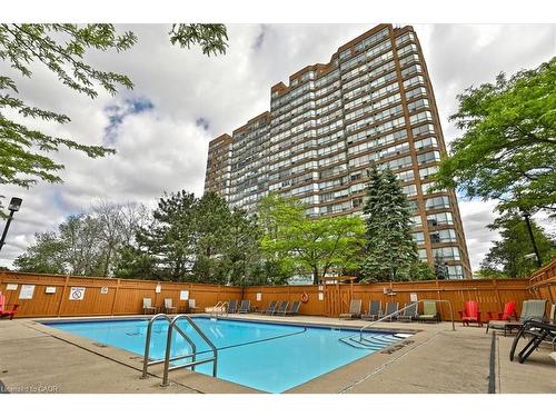 404-1270 Maple Crossing Boulevard, Burlington, ON - Outdoor With In Ground Pool