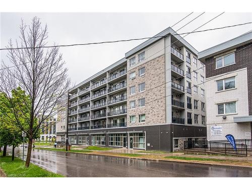 609F-275 Larch Street, Waterloo, ON - Outdoor With Balcony With Facade