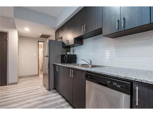 609F-275 Larch Street, Waterloo, ON - Indoor Photo Showing Kitchen With Double Sink