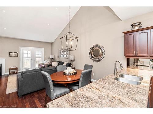 13 Mulligan Trail, Hamilton, ON - Indoor Photo Showing Dining Room With Fireplace