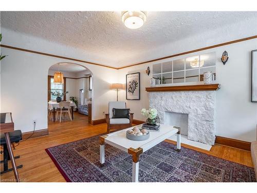 26 Weir Street S, Hamilton, ON - Indoor Photo Showing Living Room With Fireplace