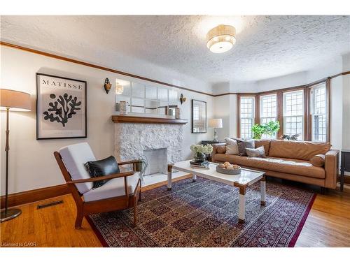 26 Weir Street S, Hamilton, ON - Indoor Photo Showing Living Room With Fireplace