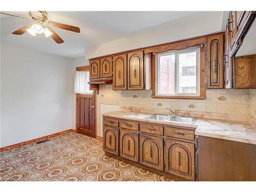 53 Sherman Avenue N, Hamilton, ON - Indoor Photo Showing Kitchen With Double Sink