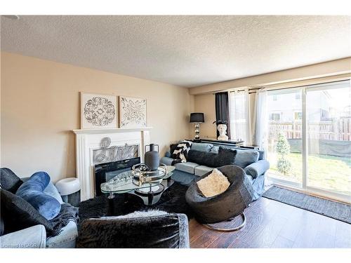 102 Donnenwerth Drive, Kitchener, ON - Indoor Photo Showing Living Room With Fireplace
