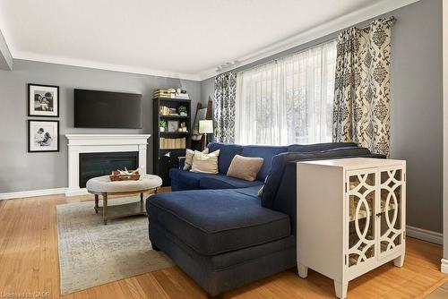 7 Prince Charles Drive, St. Catharines, ON - Indoor Photo Showing Living Room With Fireplace