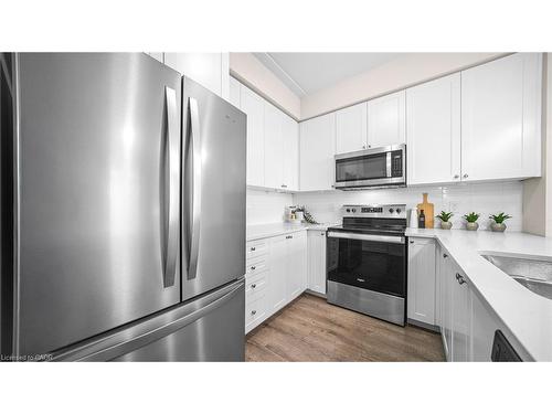 304-610 Farmstead Drive, Milton, ON - Indoor Photo Showing Kitchen With Stainless Steel Kitchen With Upgraded Kitchen
