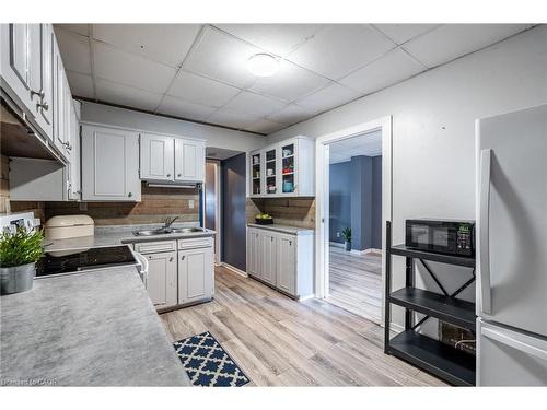 52 Connaught Avenue N, Hamilton, ON - Indoor Photo Showing Kitchen With Double Sink