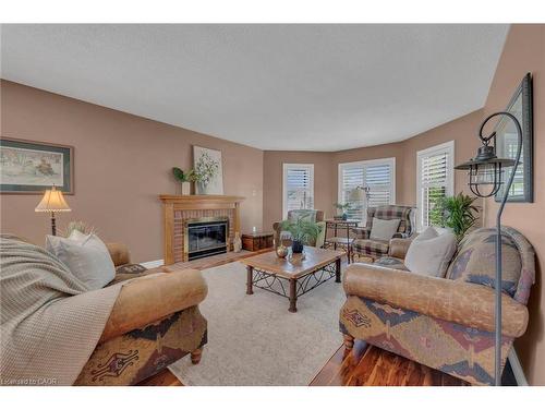 35 Highland Boulevard, Caledonia, ON - Indoor Photo Showing Living Room With Fireplace