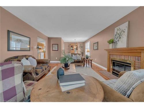 35 Highland Boulevard, Caledonia, ON - Indoor Photo Showing Living Room With Fireplace