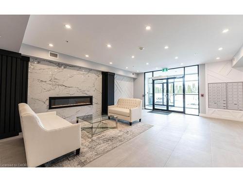 406-120 Springvalley Crescent, Hamilton, ON - Indoor With Fireplace