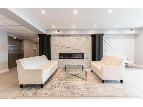 406-120 Springvalley Crescent, Hamilton, ON - Indoor With Fireplace
