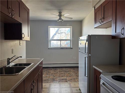 208-269 Parkdale Avenue N, Hamilton, ON - Indoor Photo Showing Kitchen With Double Sink