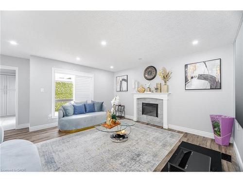 34 Chipmunk Crescent, Brampton, ON - Indoor Photo Showing Living Room With Fireplace