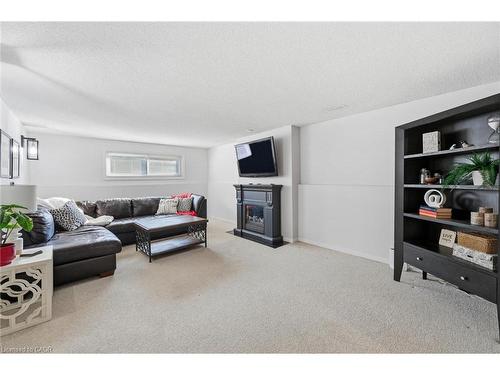 123 Athenia Drive, Stoney Creek, ON - Indoor Photo Showing Living Room With Fireplace